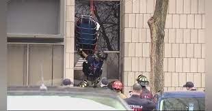 MI Rescue Technicians Rappel Worker from Top of Building