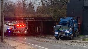 Trash Truck Explodes After Hitting IN Railroad Bridge