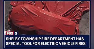 MI Departments Add Special Blanket to Quell Flames on Electric Vehicles