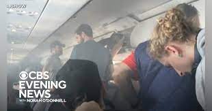 Battery Fire in Overhead Compartment Forces Flight to Land