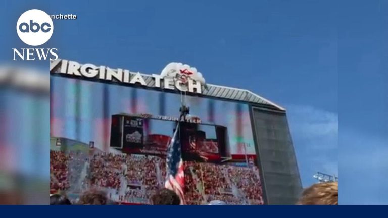 Skydiver rescued after crashing into video board at Virginia Tech game